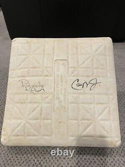 Game used base signed by Cal Ripken Jr. And Brooks Robinson