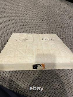 Game used base signed by Cal Ripken Jr. And Brooks Robinson