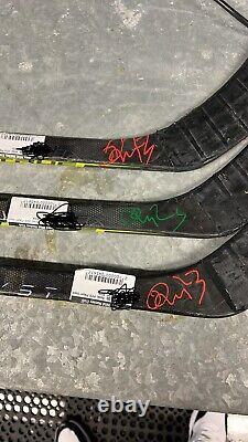 Marco Rossi Game used hand signed stick Minnesota Wild