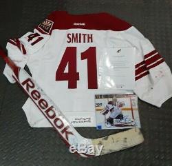 Mike Smith Game Worn Jersey, signed game used Smith hockey stick & 8x10 photo
