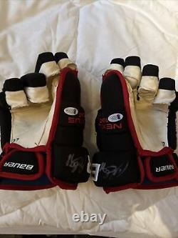 Patrick Kane Game used Gloves Autographed With COA