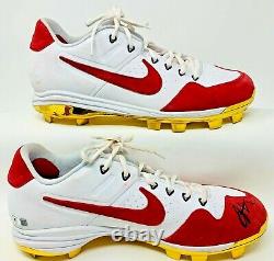 Chaussures Nike de baseball utilisées lors d'un match signées par Joey Votto des Reds, certifiées par Beckett BAS WN26226 WN26227.