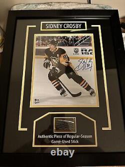 Photo signée de Sidney Crosby avec bâton utilisé en match
